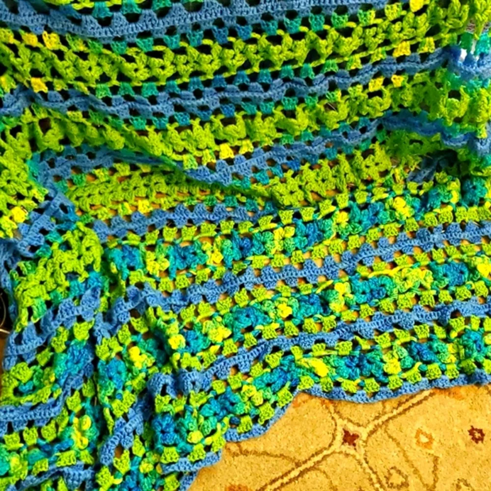Mile a minute afghan in lime green, bright blue